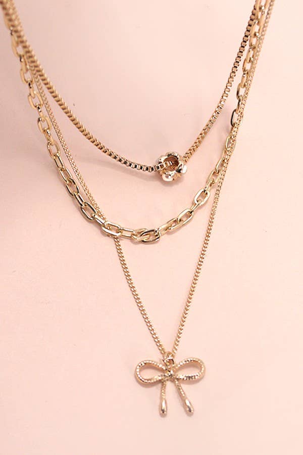 MULTI LAYER PEARL BOW CHARM NECKLACE | 80N605