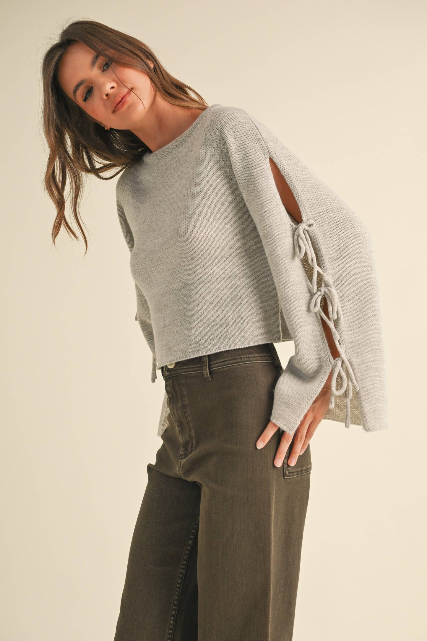 RIBBON TIE ON SLEEVE DETAIL SWEATER TOP